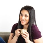 Person drinking coffee.